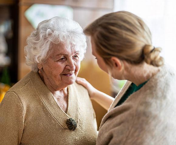 Carer with Elderly lady in her home